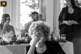 At Agate Cove Inn, Mendocino, a wedding photo shows a grandmother and bride wiping tears. The bride's mother gives a toast during the California reception.